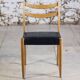 Pair of Scandinavian chairs in teak and faux leather, 1960.