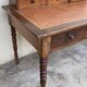 Antique desk with leather top and turned legs, 98 x 60.