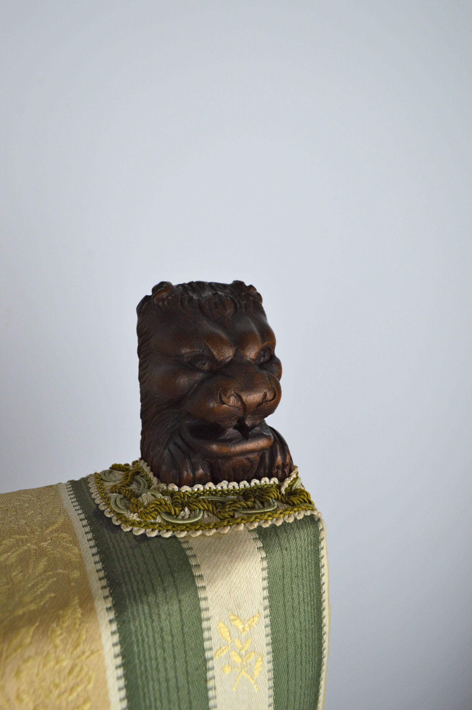 Neo-Renaissance walnut armchair with lion heads, circa 1880