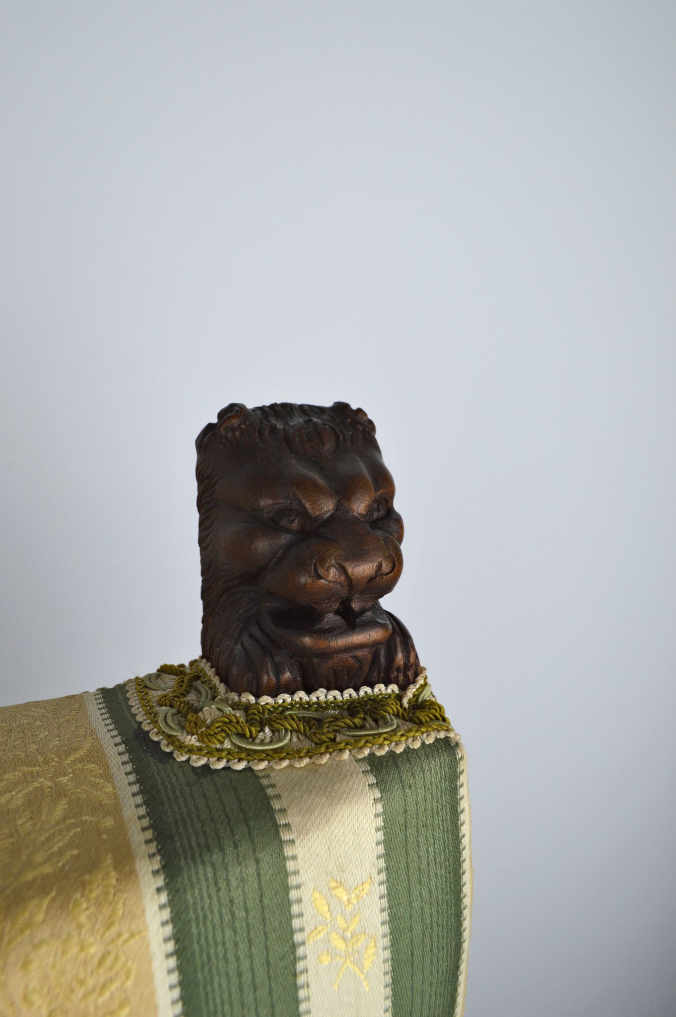 Neo-Renaissance walnut armchair with lion heads, circa 1880