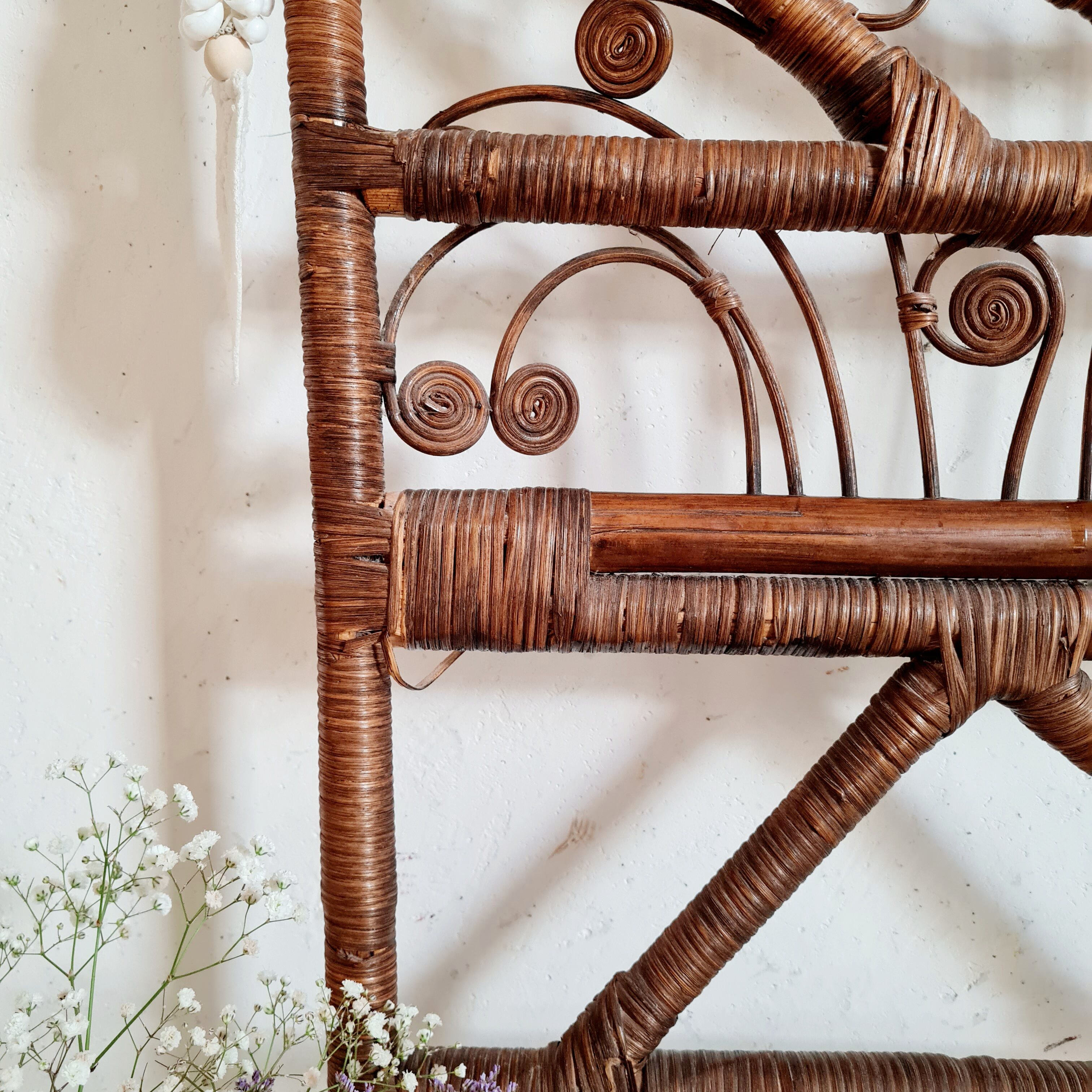 Peacock headboard in vintage rattan