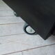 Vintage furniture with metal plugs on black wheels wooden tray