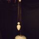 1930s brass "up and down" suspension