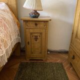 Vintage wooden bedside table painted brown, with a drawer and door, painted decoration from the 1890s.