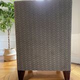 Fauteuil gris clair réalisé par un artisan