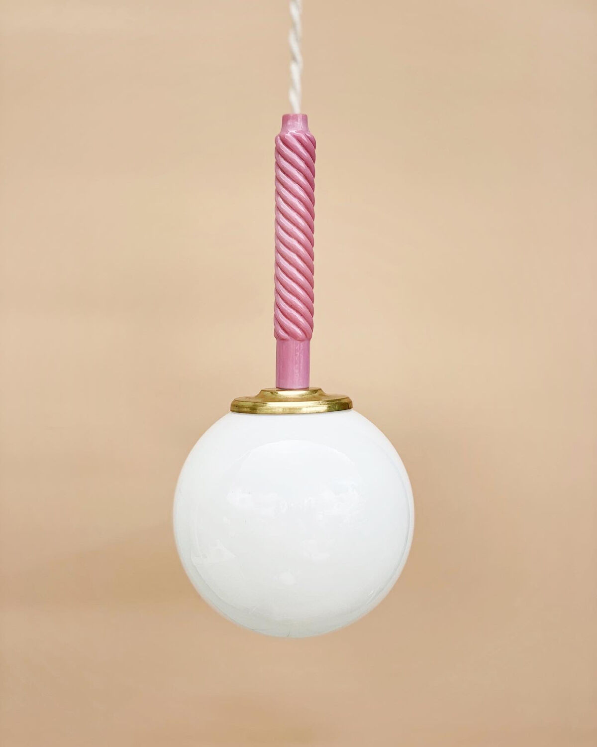 Suspension globe and candle of antique chandelier in opaline