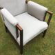 Fauteuil rembourré en chêne vintage sur des roulettes en beige
