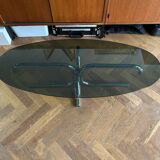70s design oval coffee table in smoked black glass with chrome legs.