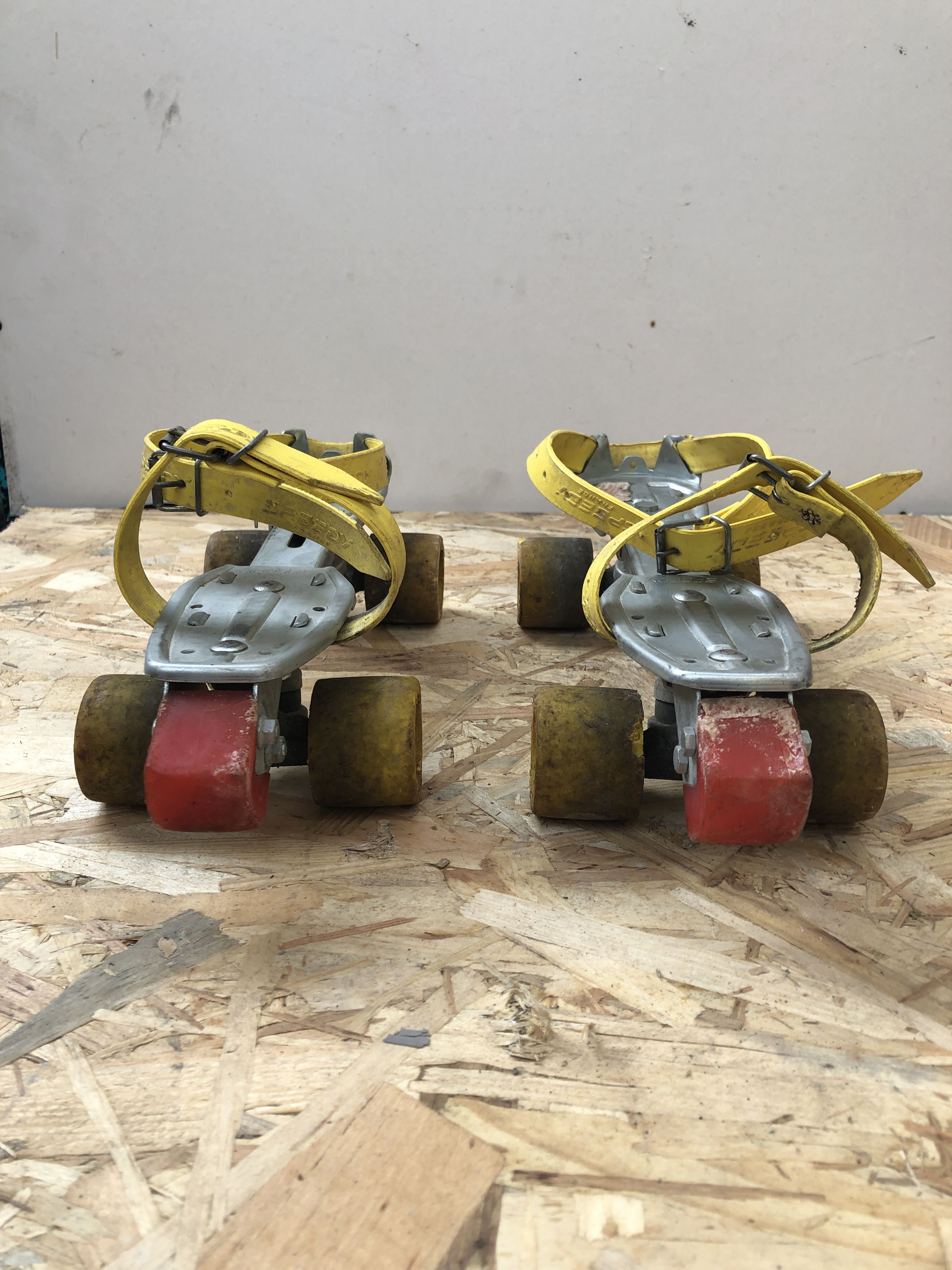 Old pair of speedy metal roller skates grey + straps & vintage brake