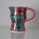 Vintage pitcher red and green art pottery