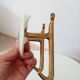 Set of 2 wall coat hooks in Bakelite and brass from the 1950s/60s.