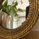 Round golden convex mirror with mouldings - witch's mirror