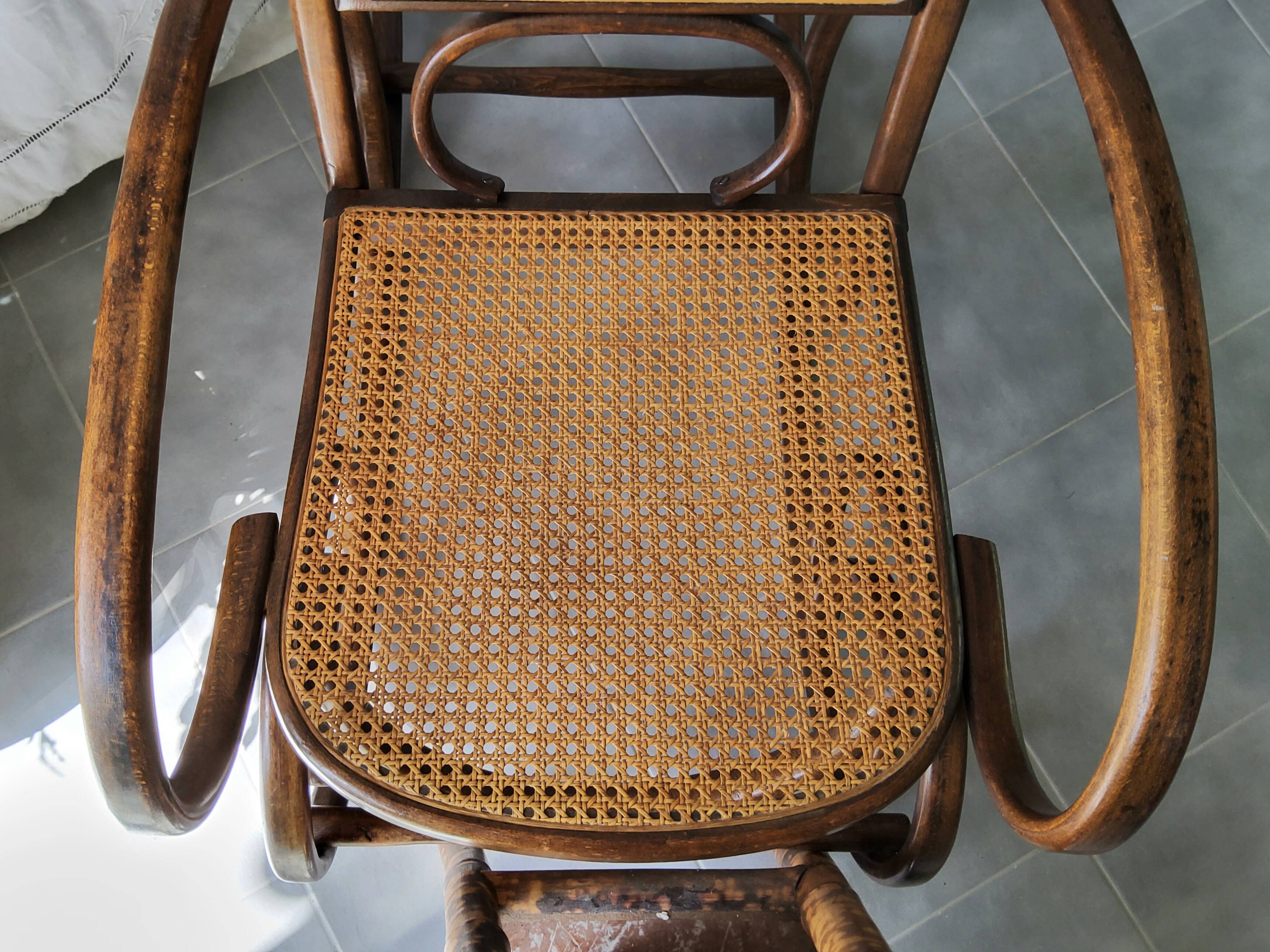 Antique caned rocking chair