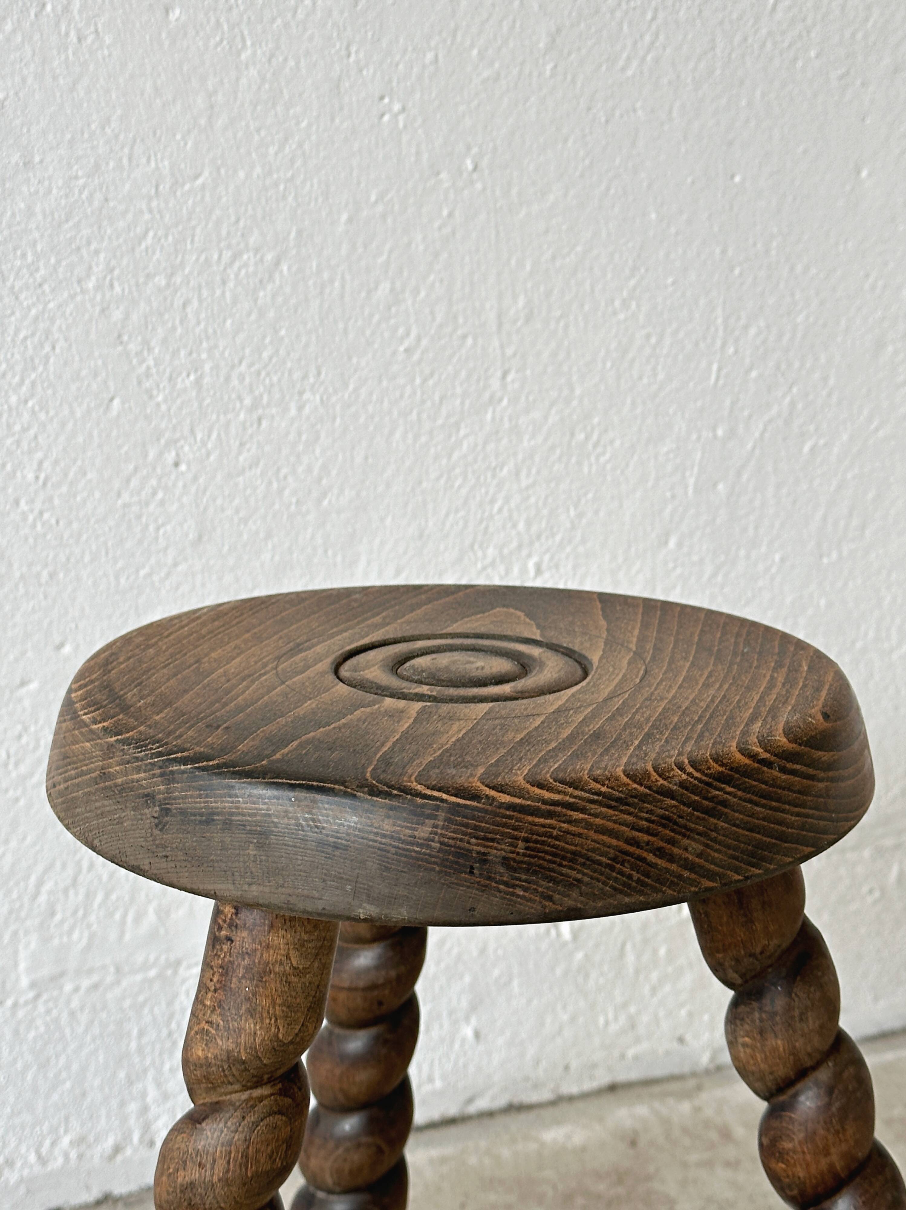 Antique wooden tripod stool