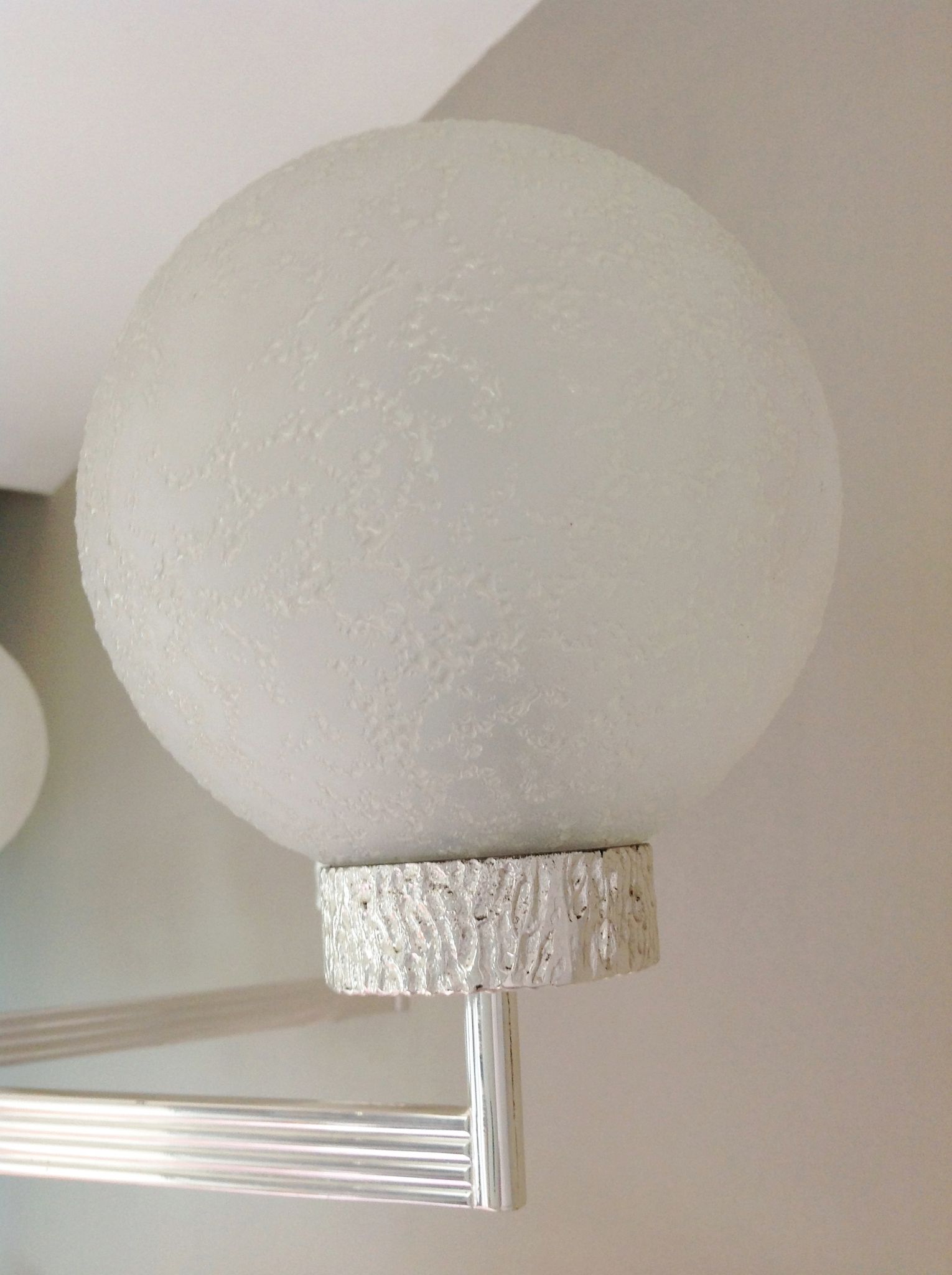 Six-light chrome metal chandelier and opaque glass globes / vintage 60s and 70s