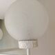 Six-light chrome metal chandelier and opaque glass globes / vintage 60s and 70s