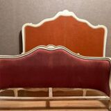 Upholstered bed in rosewood fabric
