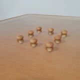 Rare coffee table 110 x 110 x height 35 cm with 8 flange wooden / cork caps in the glass top.