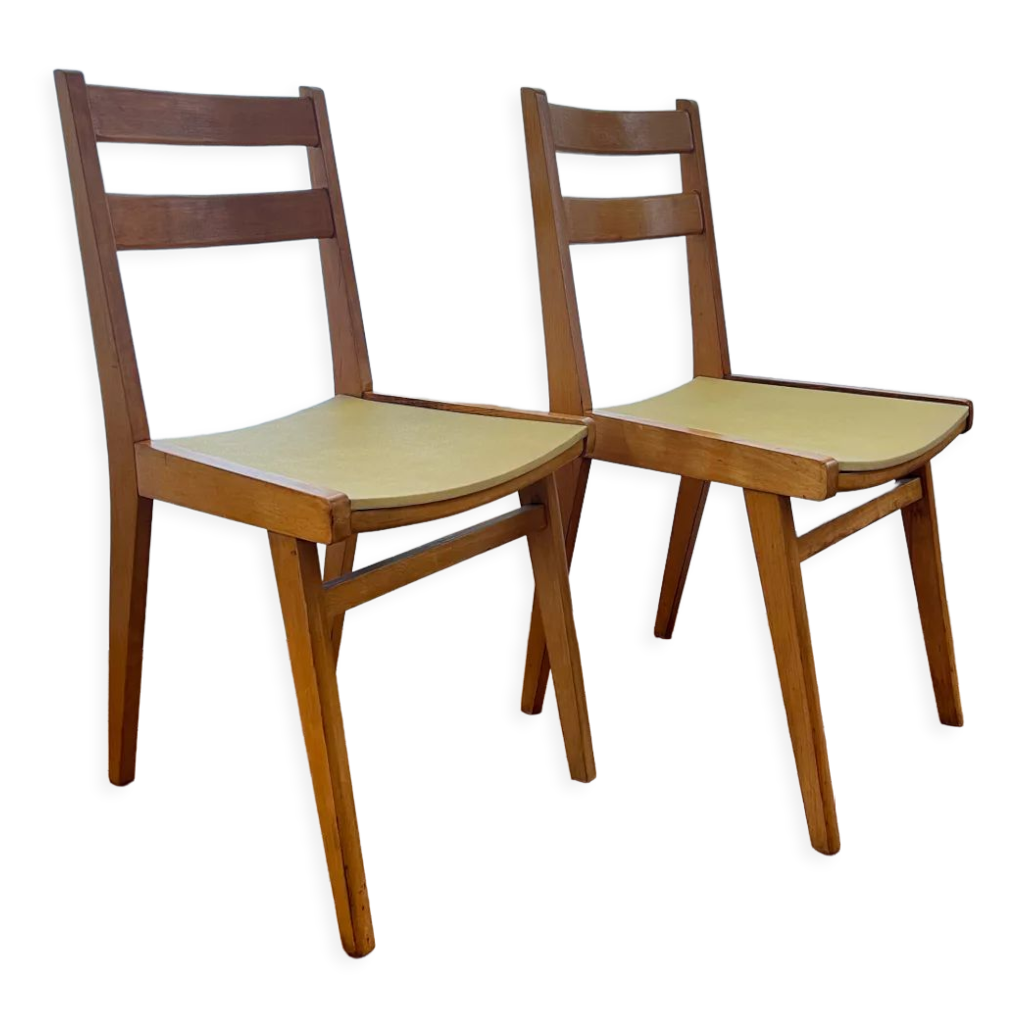 Vintage chairs in wood and skai legs from the 1950s