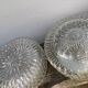 Pair of transparent round glass wall lights