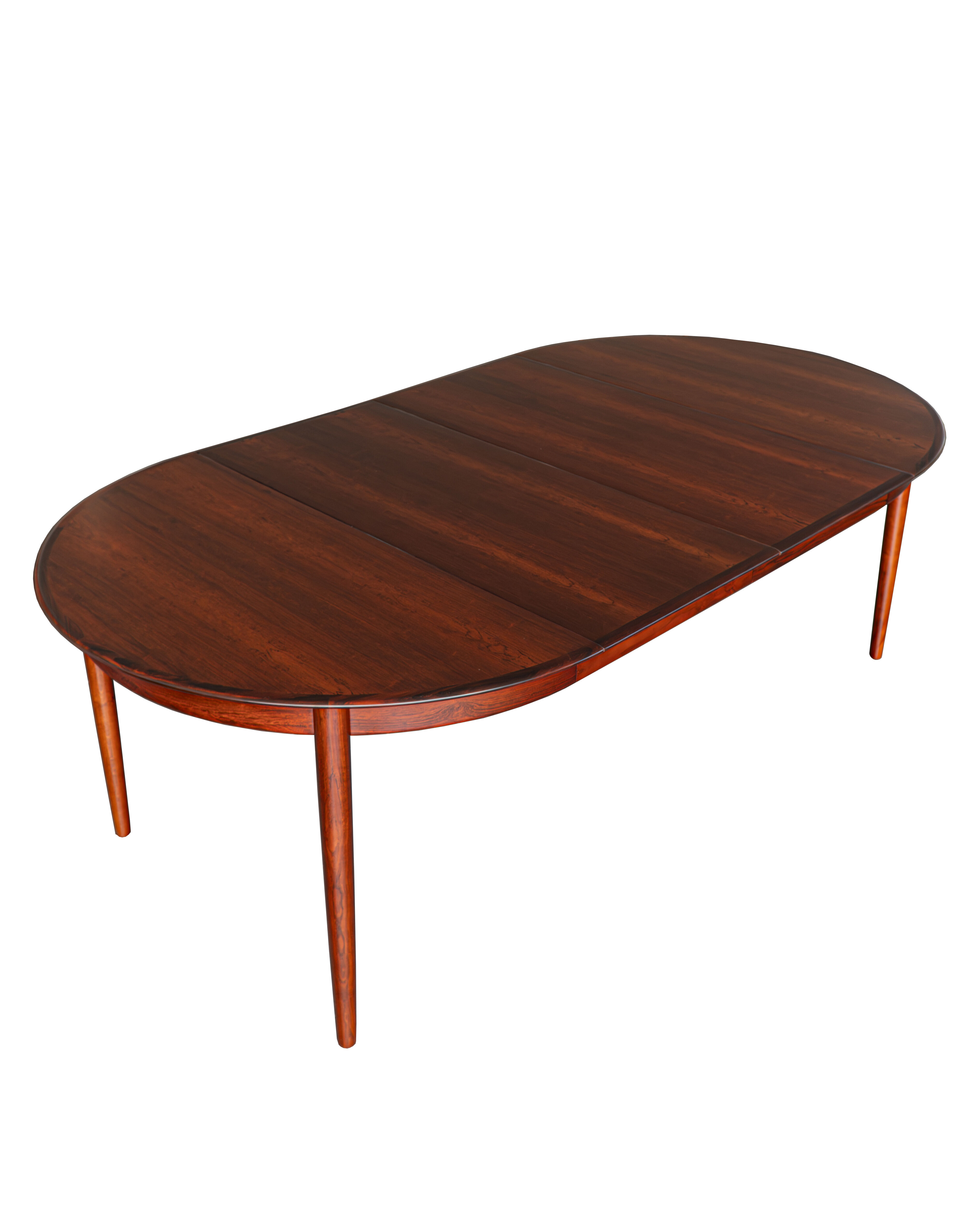 Danish extendable rosewood dinning table by Skovby