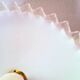 Suspension in pleated opaline