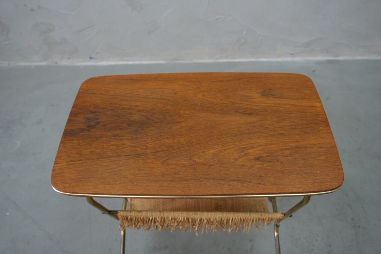 Mid-century teak and brass mobile side table with magazine holder, 1960s