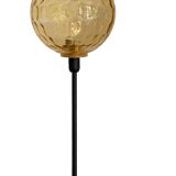Table lamp with an antique vintage gold globe, mounted on a gold base