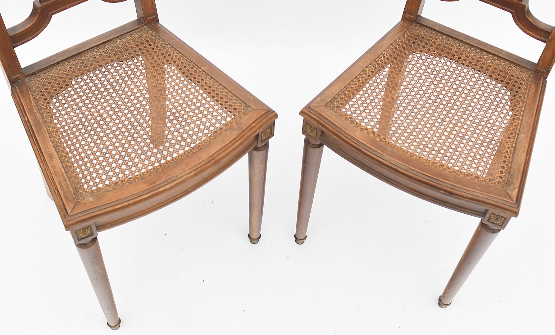 Pair of chairs canned from the 1900s period