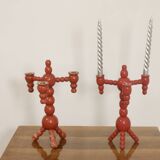 Pair of red wooden candelabra from Sweden 1970