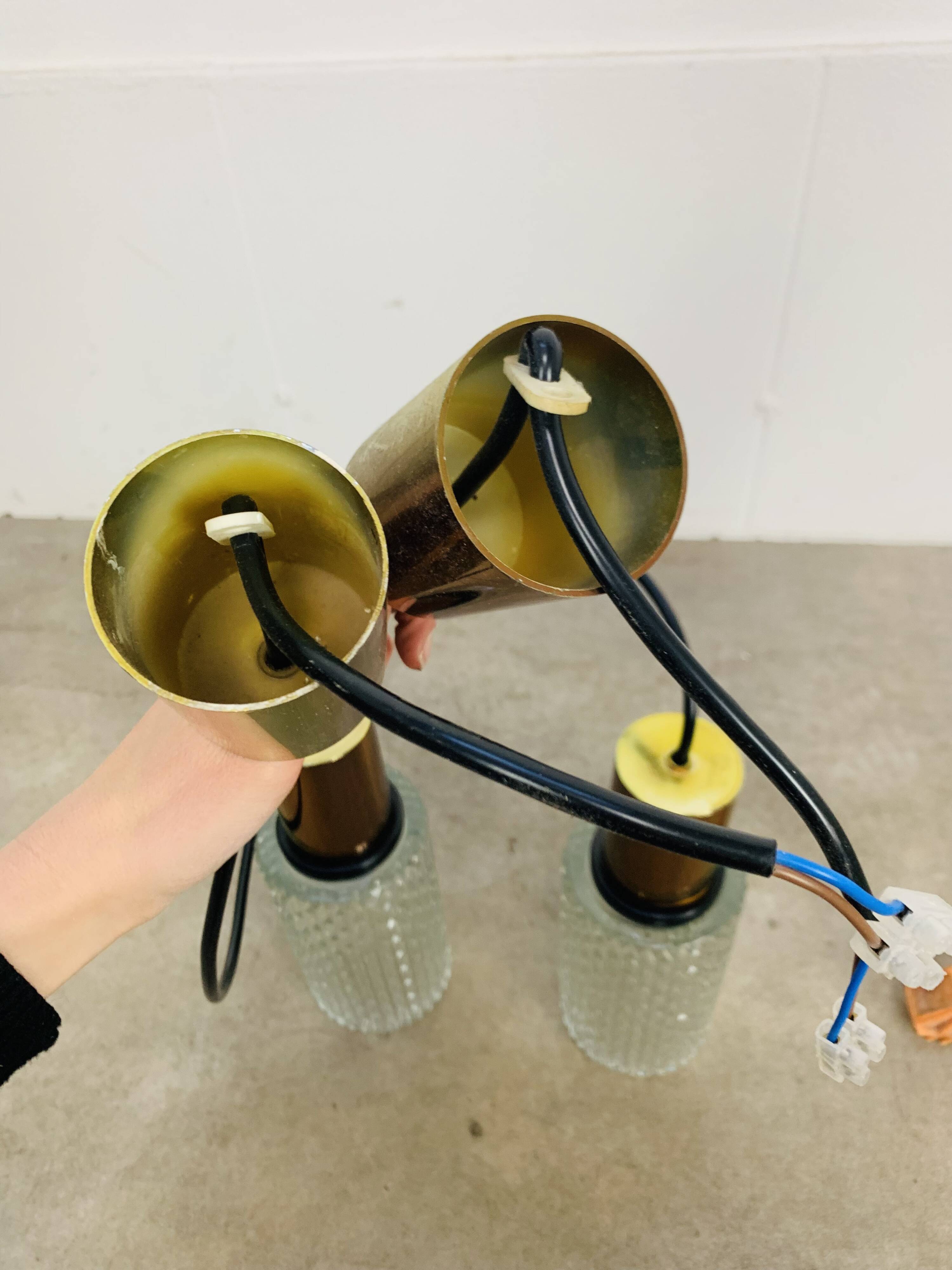 Pair of vintage cut glass pendant lights from the 1970s.