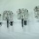 Set of four large Murano glass elements and chromed brass sconces, Italy 60
