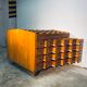 Double-sided wooden industrial filing cabinet with 48 vintage drawers