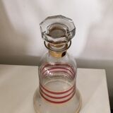 Glass carafe and two glasses
