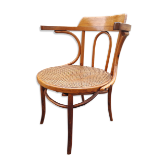 Curved wood armchair canned cannage bistro office