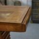 Solid oak table with central pedestal base and storage, Charles Dudouyt, 1950s
