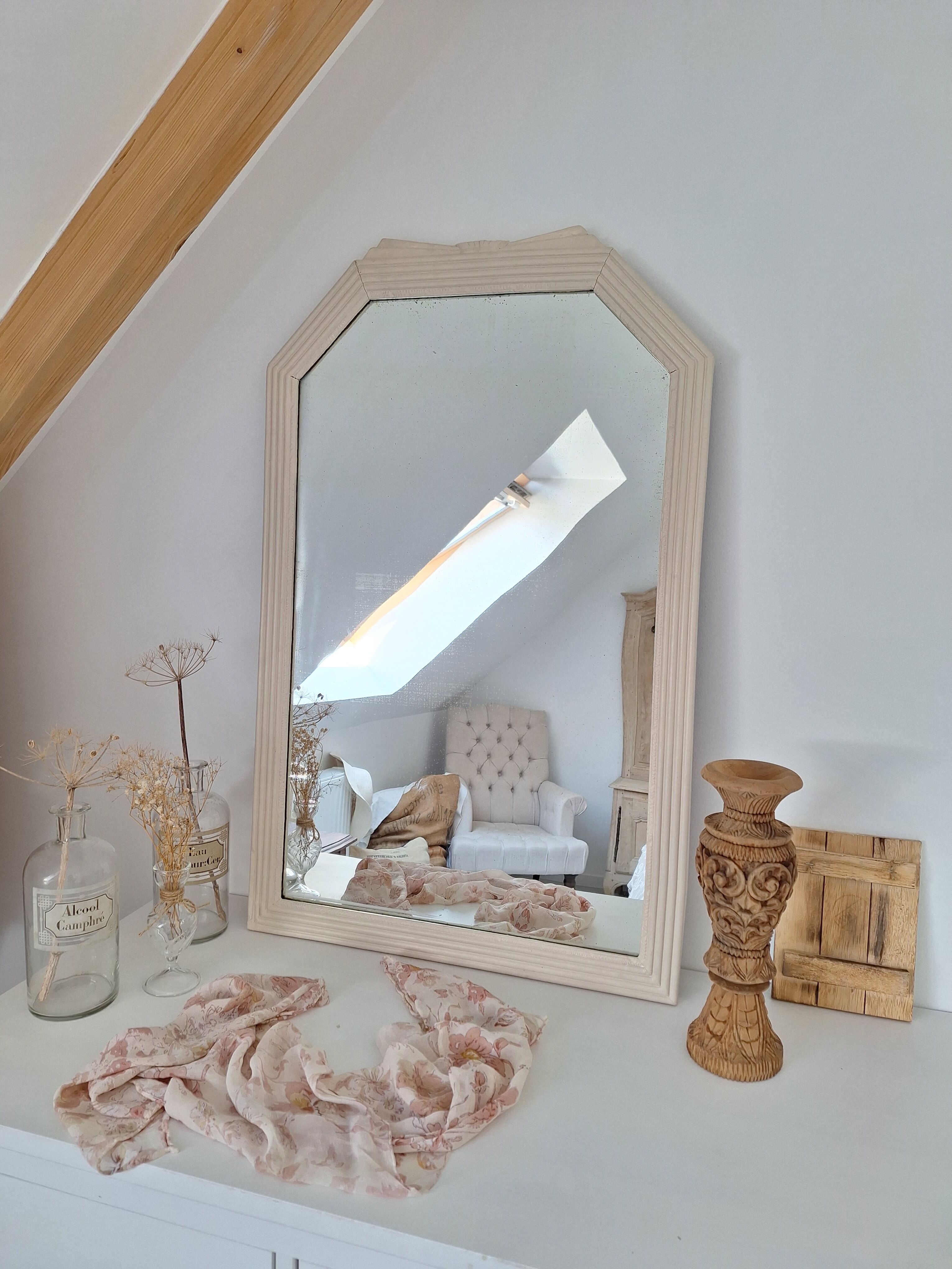 Beige bevelled and moulded mirror