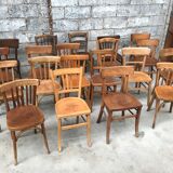 Lot of 15 mismatched bistro chairs in curved wood