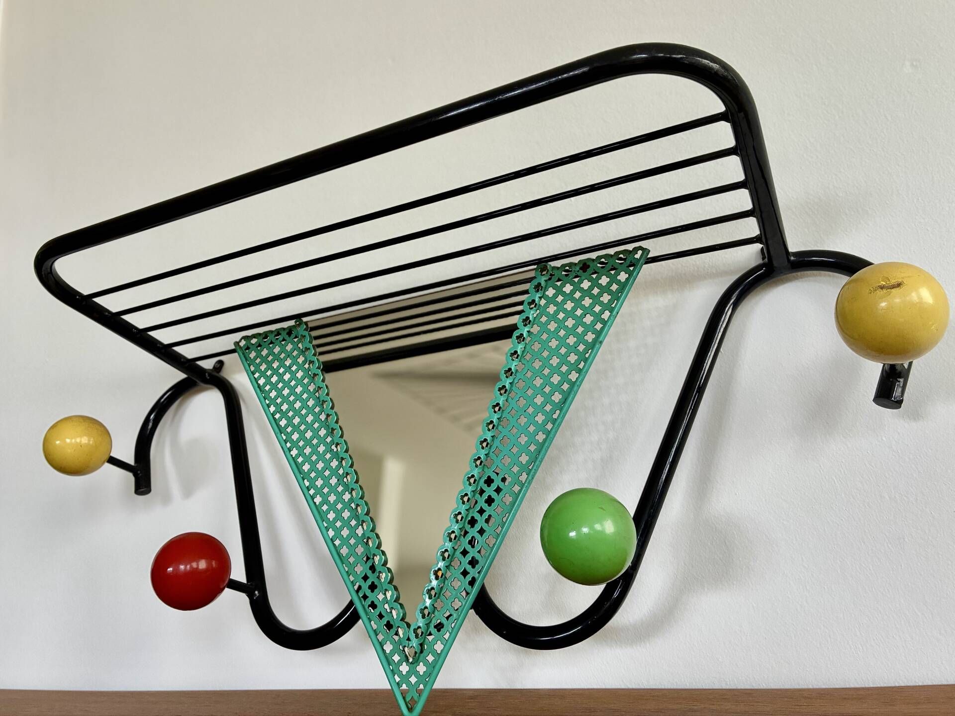 Vintage wall coat rack from the 1950s.