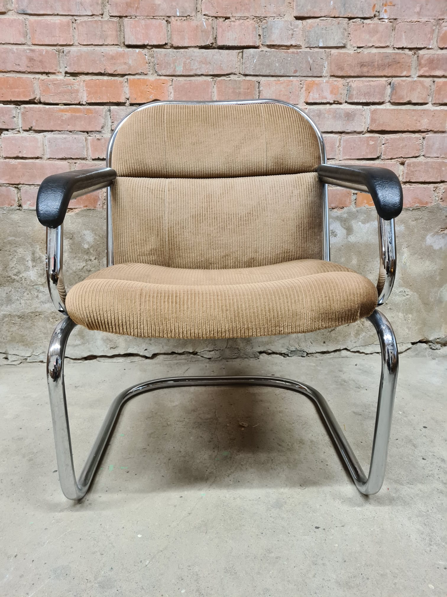 Vintage tubular ribbed office armchair