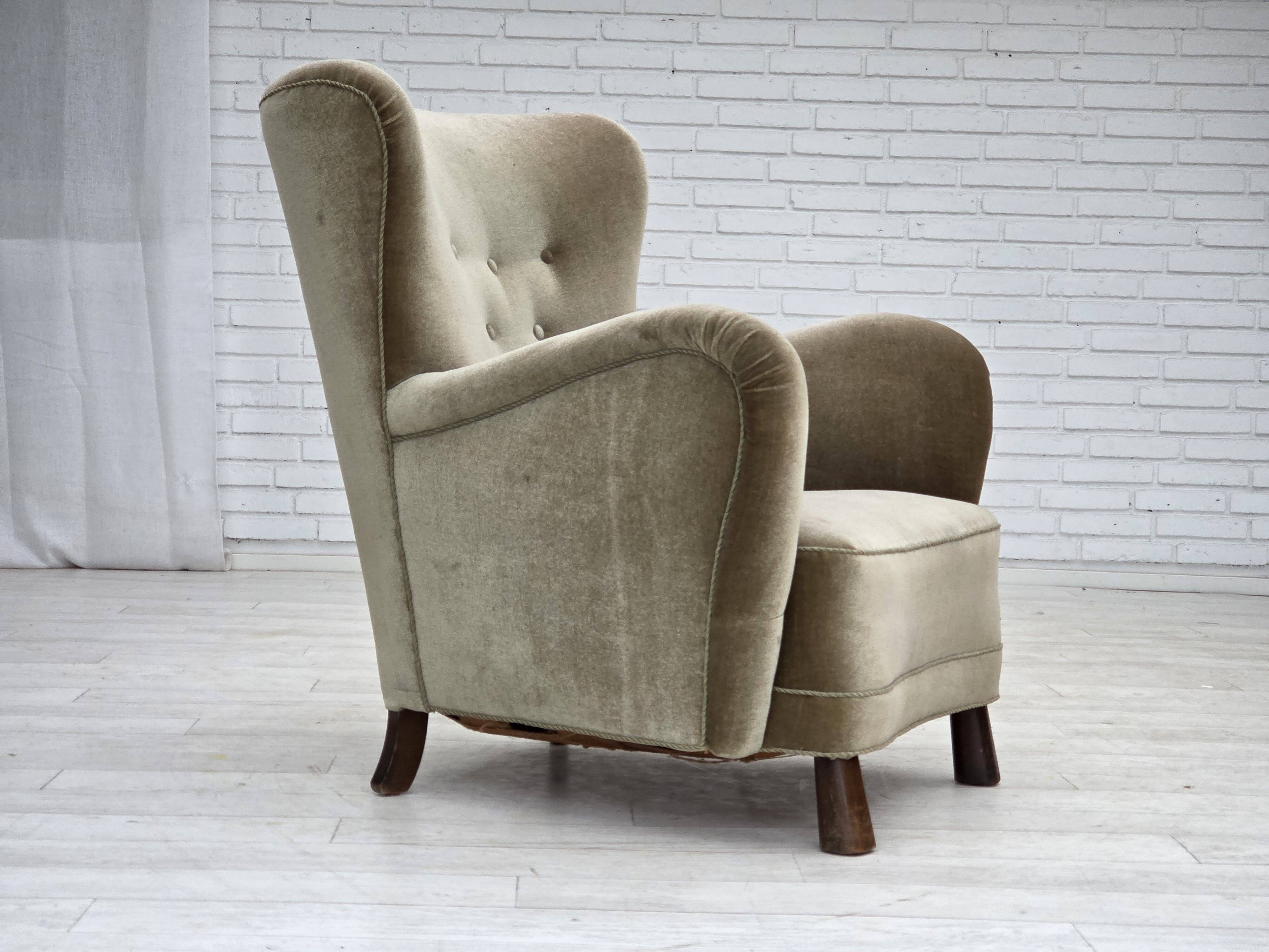 1960s, Danish armchair, green furniture velour, oak wood legs.