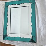 Turquoise green mirror in Hollywood Regency style