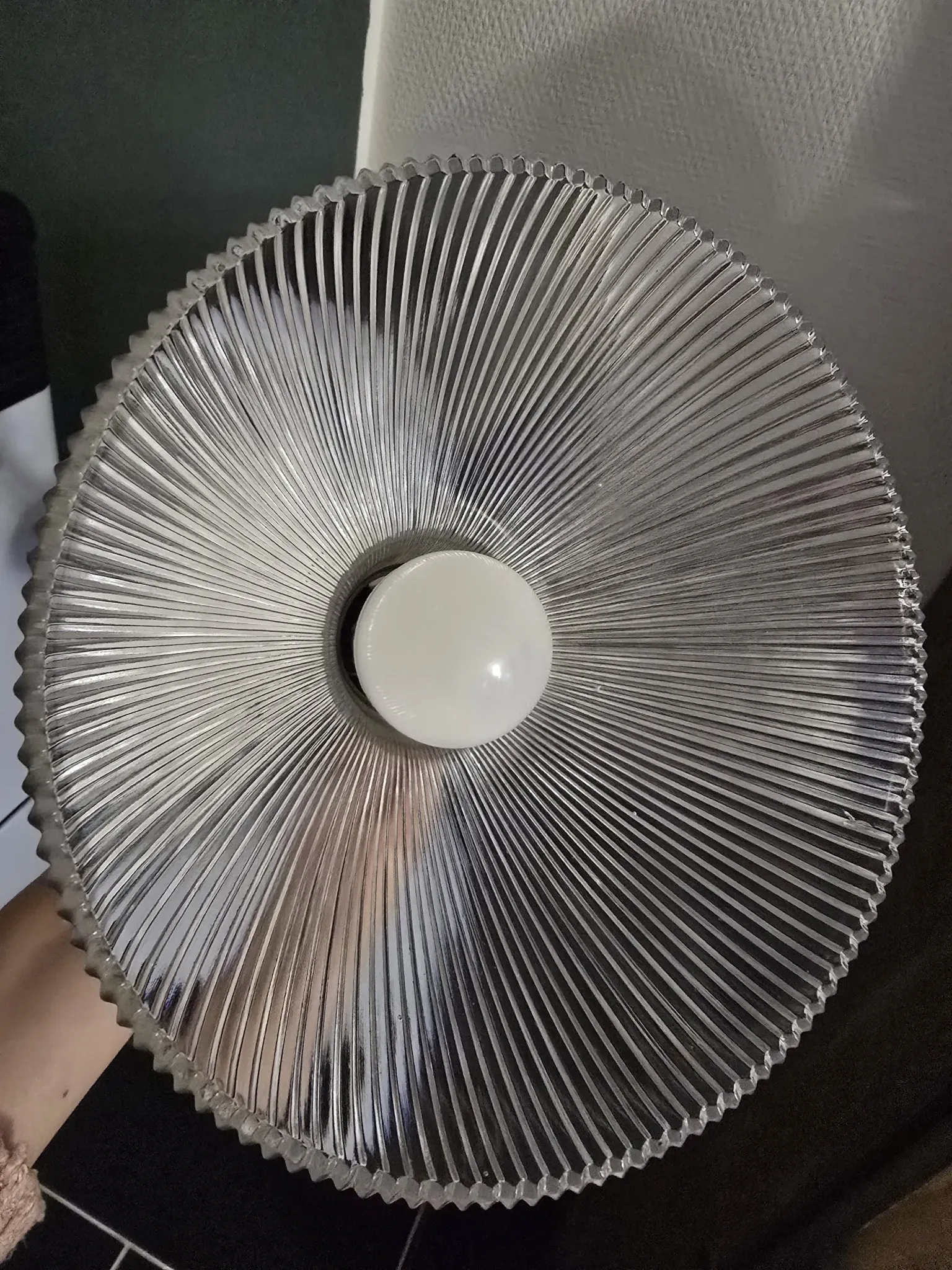 Vintage globe-style holophane on a chrome stem.