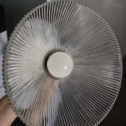 Vintage globe-style holophane on a chrome stem.