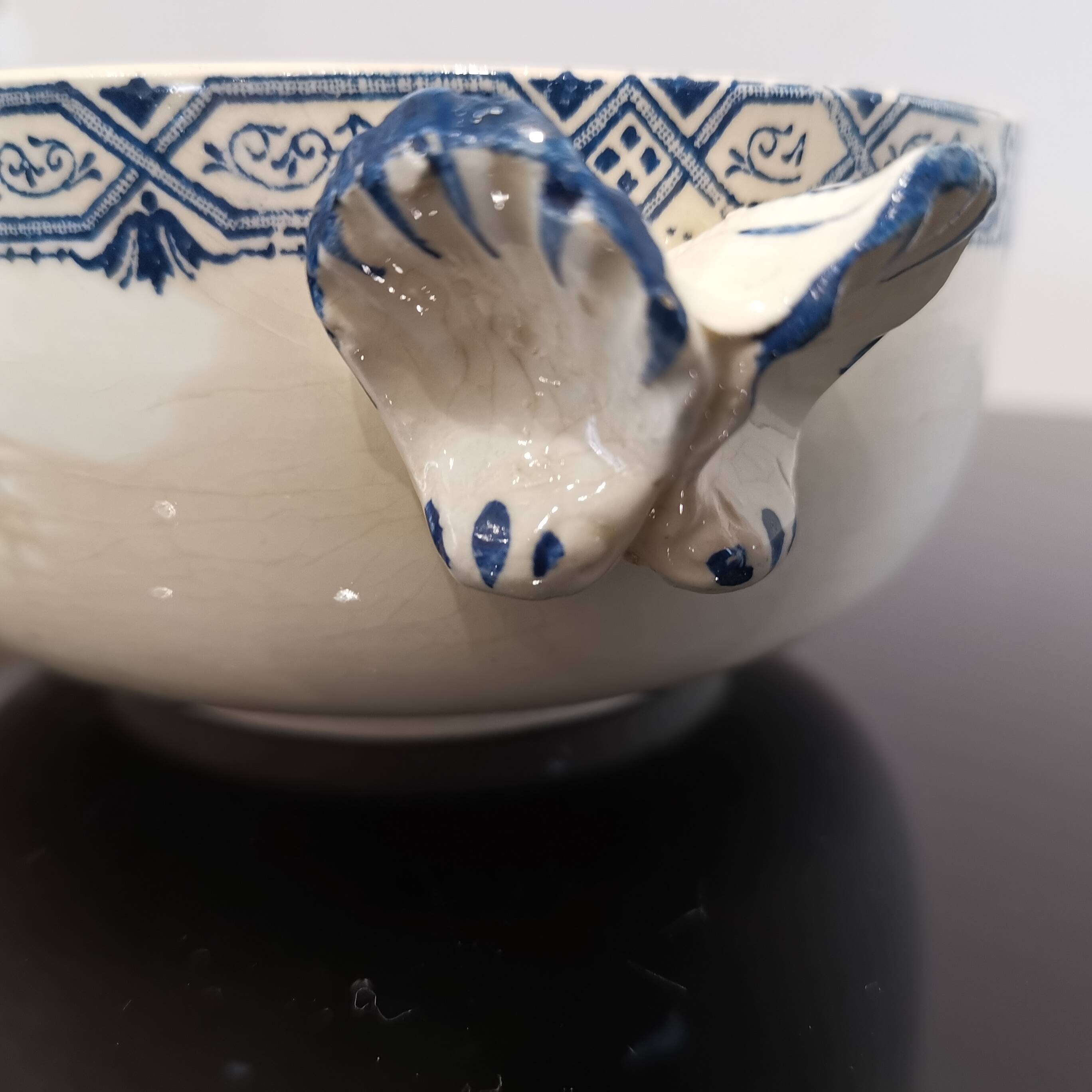 Butterfly ear bowl in iron clay with blue patterns
