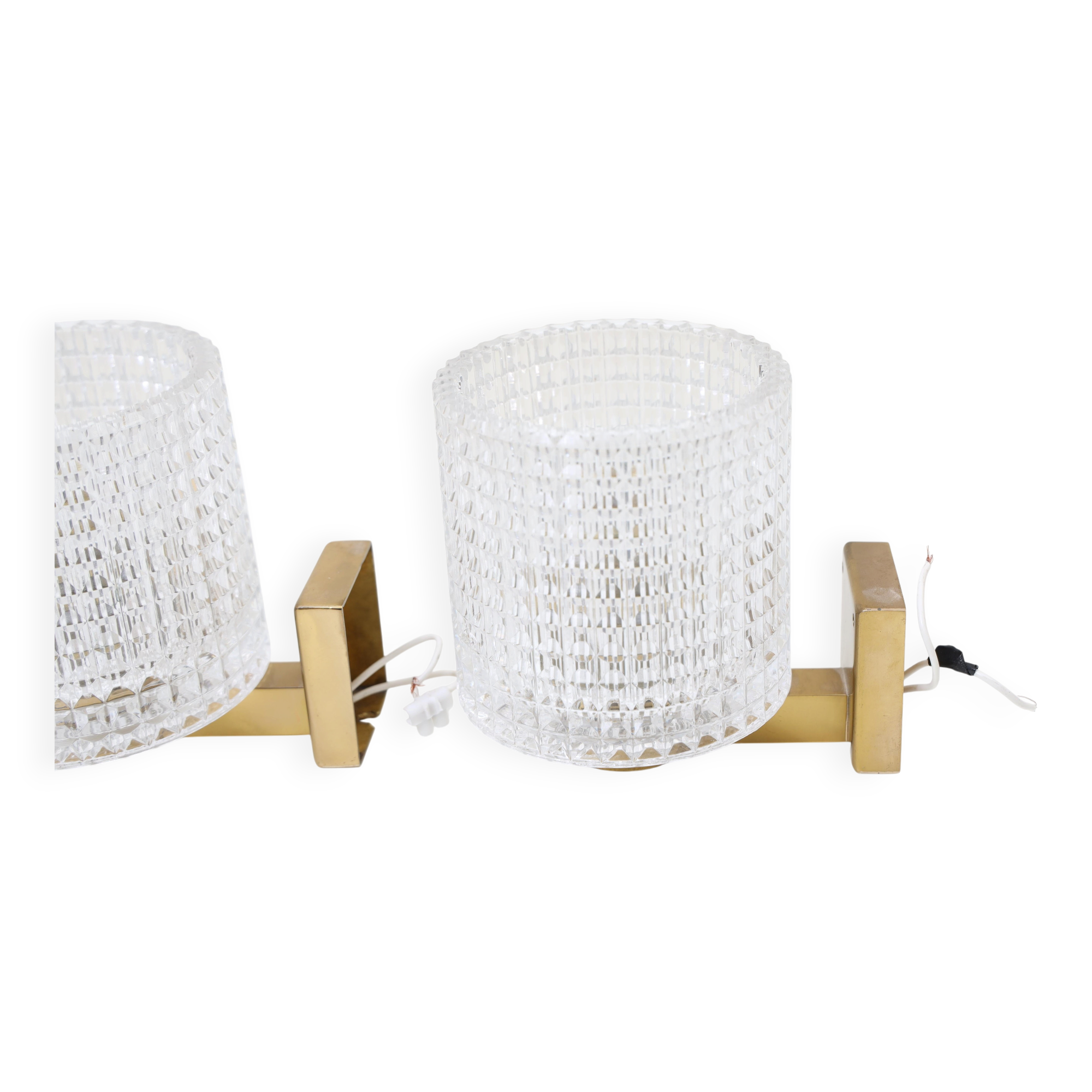 Carl Fagerlund for Orrefors Pair of wall lights in brass and glass Sweden 1960