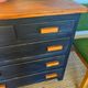 Vintage patinated black craft furniture style chest of drawers