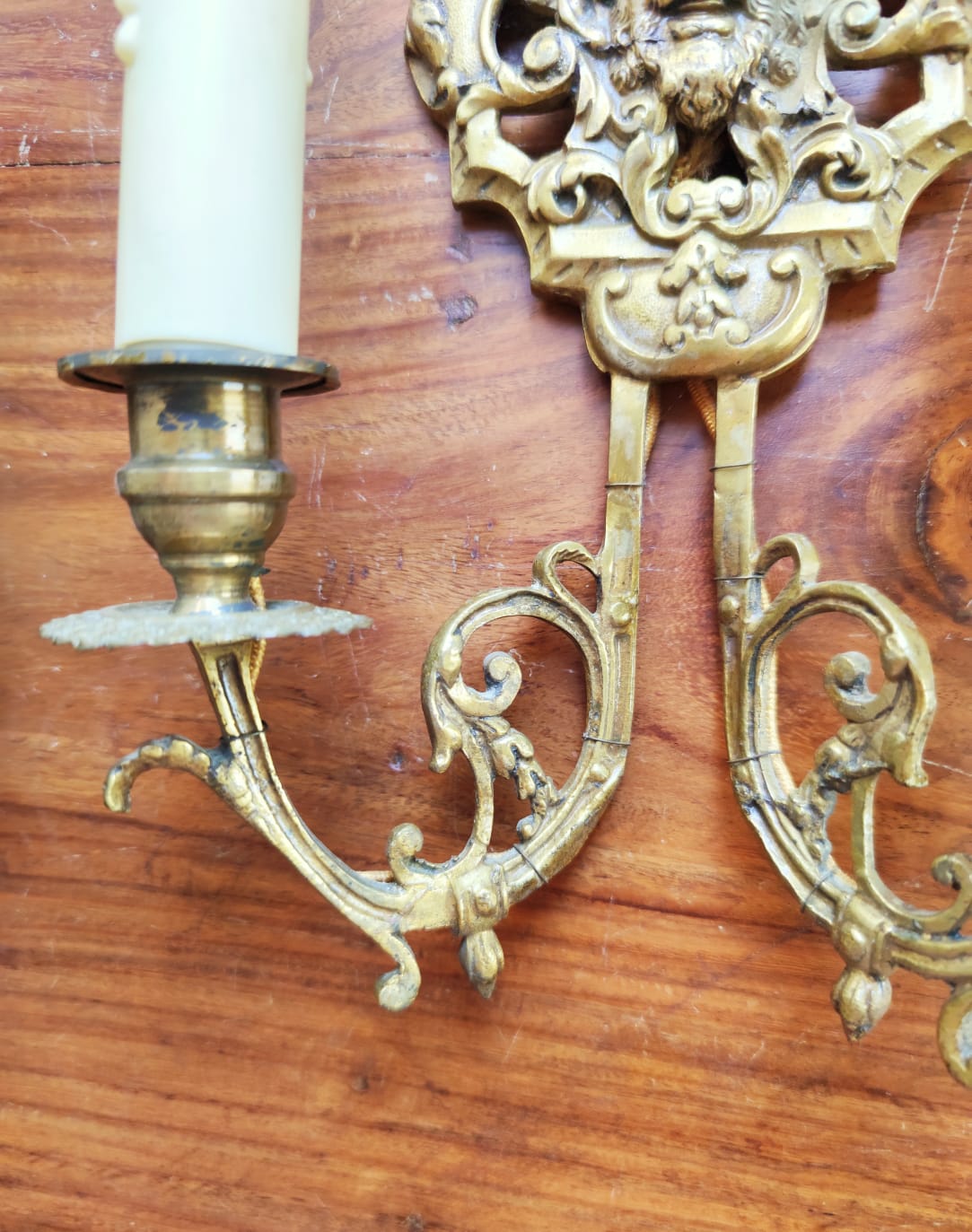 Pair of gilded bronze sconces decorated with Louis XIV style mascarons