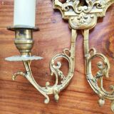 Pair of gilded bronze sconces decorated with Louis XIV style mascarons