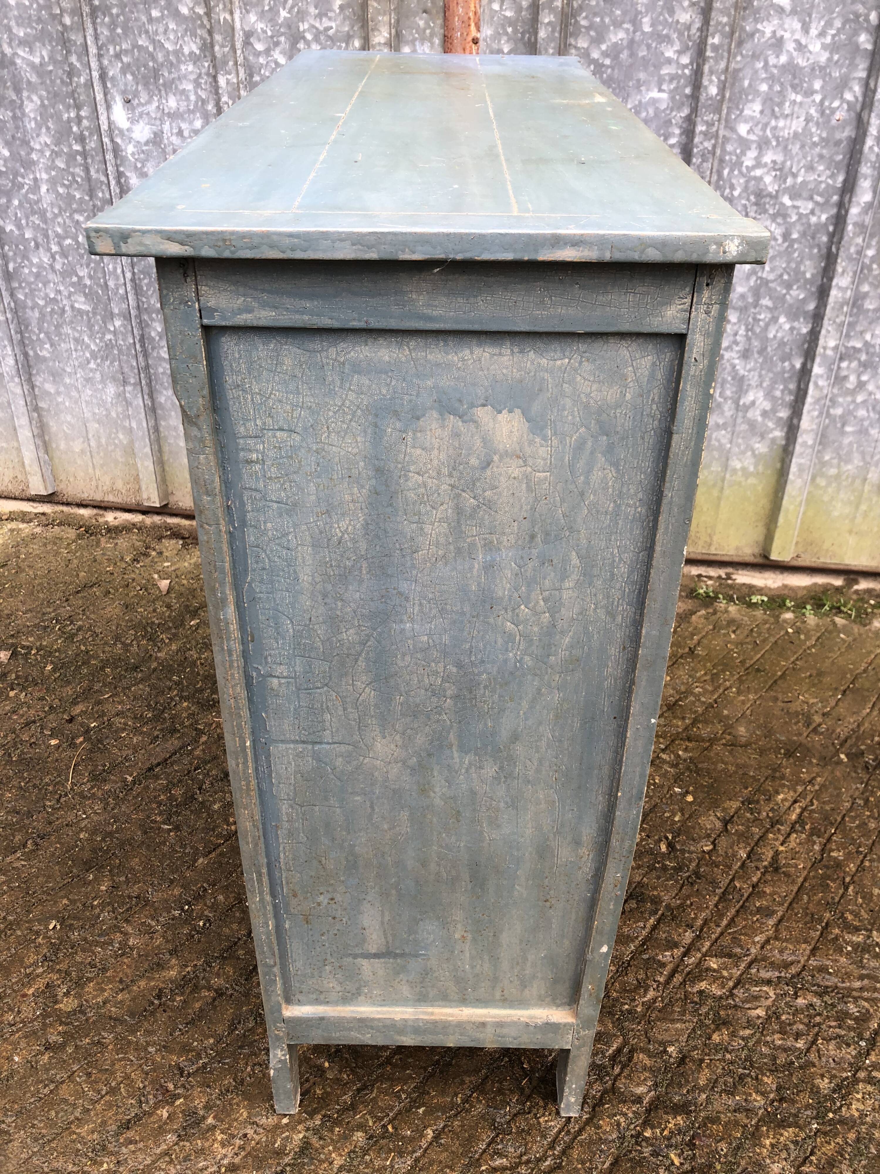 Parisian sideboard painted in blue with 2 doors and 2 drawers.